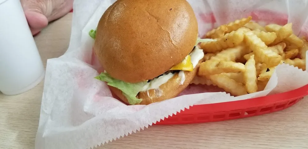Big Mouth Burger Cheese Lettuce Tomato Onion and Mayonnaise