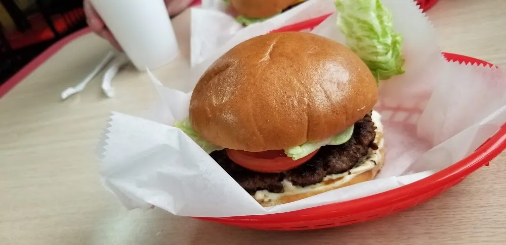 Hamburger with Mayonnaise Lettuce and Tomato
